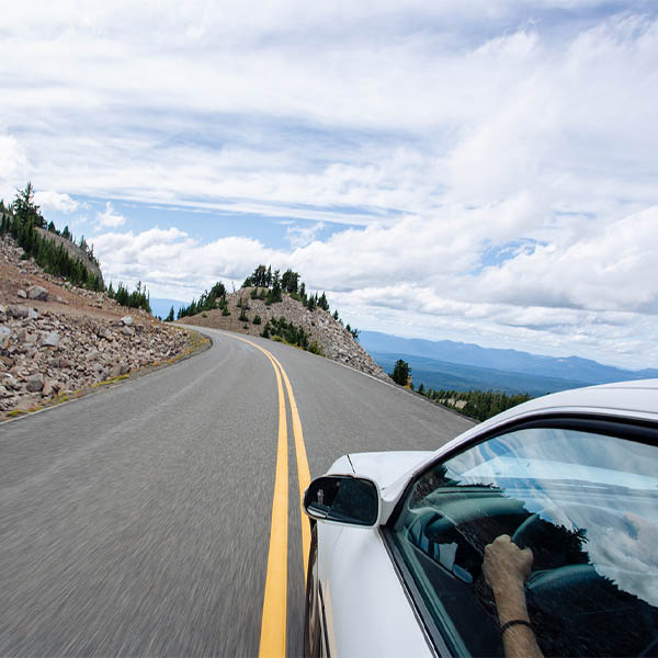 car driving through the hills of oregon