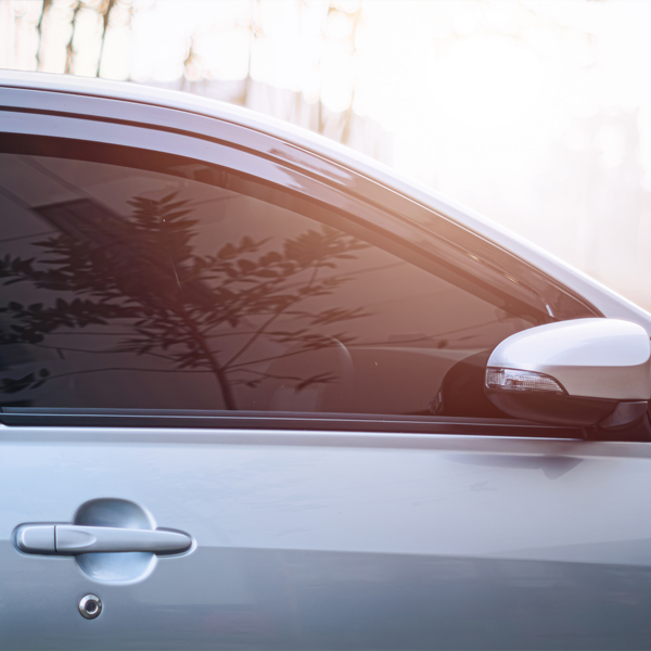 Car with rain guards on windows